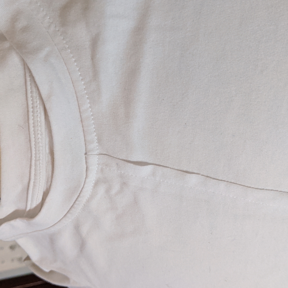 Art Class White T updated with a classy seam down the front. All white. S 6/6X